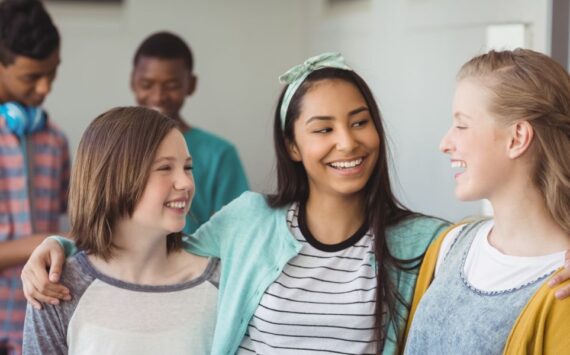 smiling-schoolgirls-standing-with-arms-around-in-c-2026-01-11-10-30-57-utc (1)